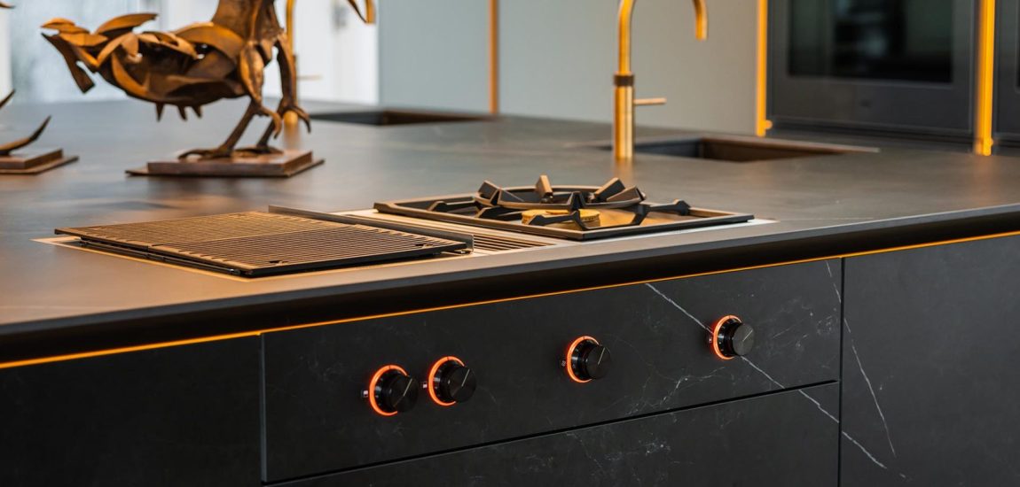 Architectural Elegance Meets Contemporary Design-021 Stuart Frazer SieMatic Kitchen | Island Detail featuring a 400 Series Vario cooktop with gas griddle and Teppanyaki plate